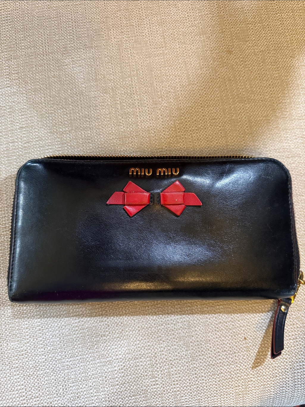Miu Miu Black Leather Zip-Around Wallet With Red Bow Accent